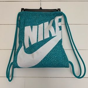 NIKE teal drawstring backpack